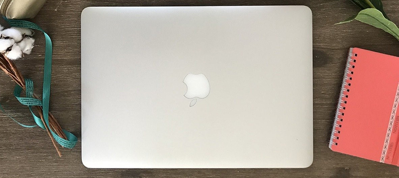 closed macbook on the table